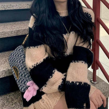 Loose black and white knitted sweater
