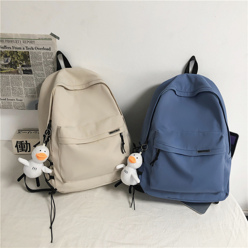 Large capacity simple casual women Backpack for travel college students school bags Black white men Backpack