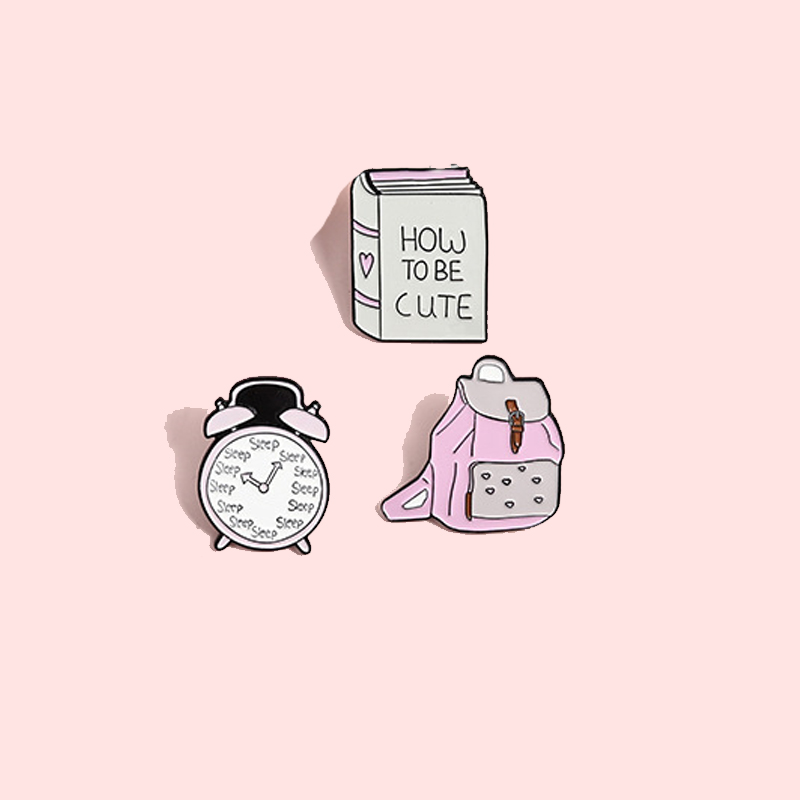 Wecker Taschenbuch Pin-Set