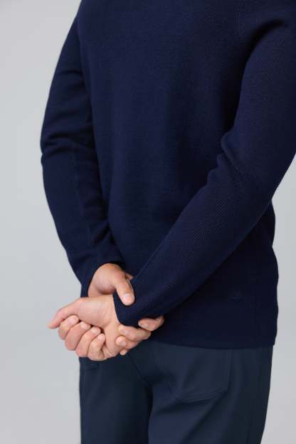 Detail back view of man wearing Tech Merino Sweater Polo in Total Eclipse