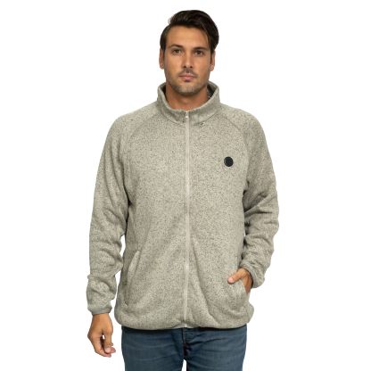 Man wearing a gray full-zip fleece jacket with a high collar and front pockets, standing against a black background.