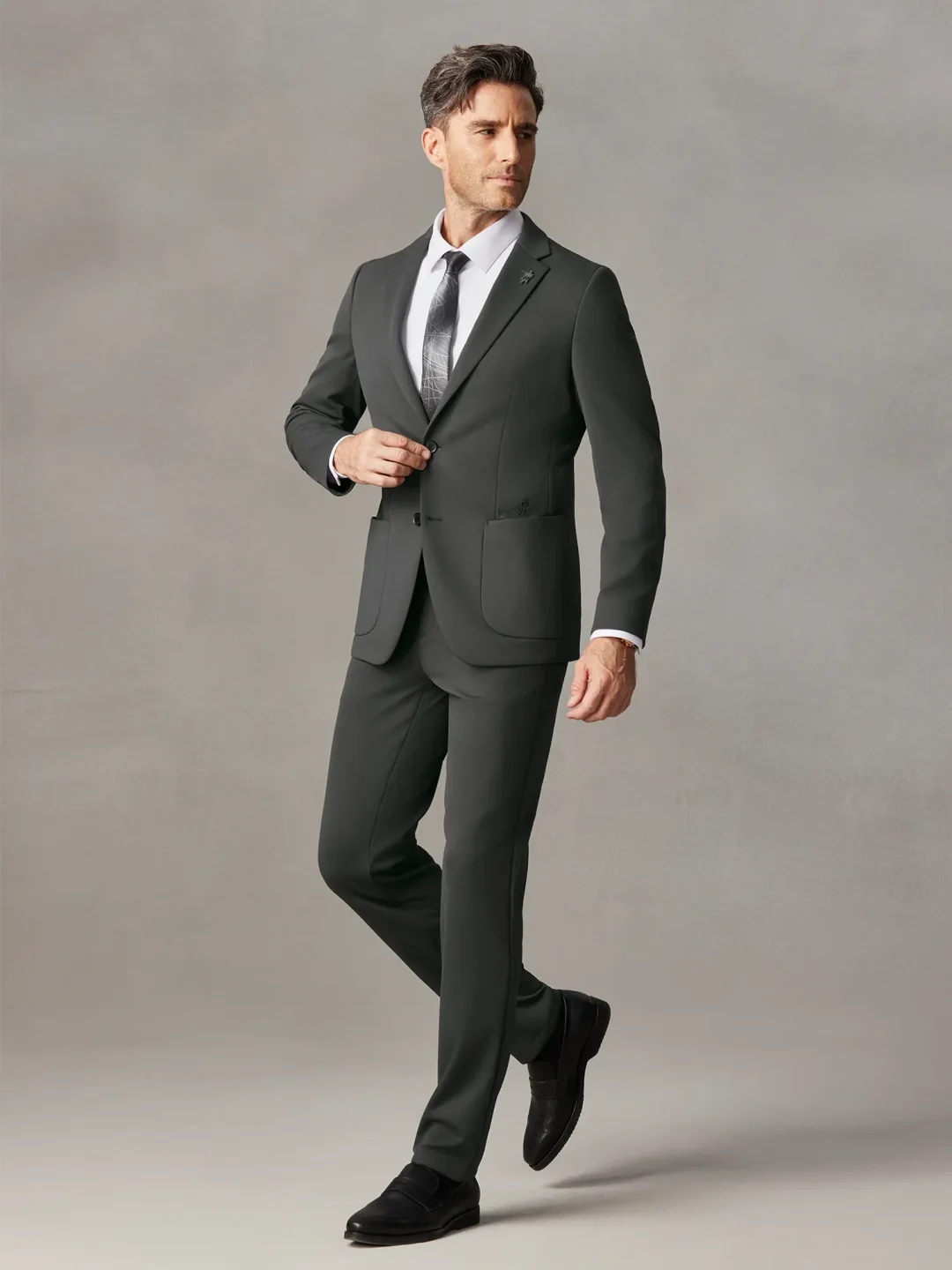 Man walking in a flexible tailored jacket