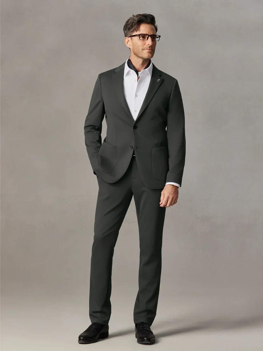 Man standing confidently in an OWNDREAM jacket