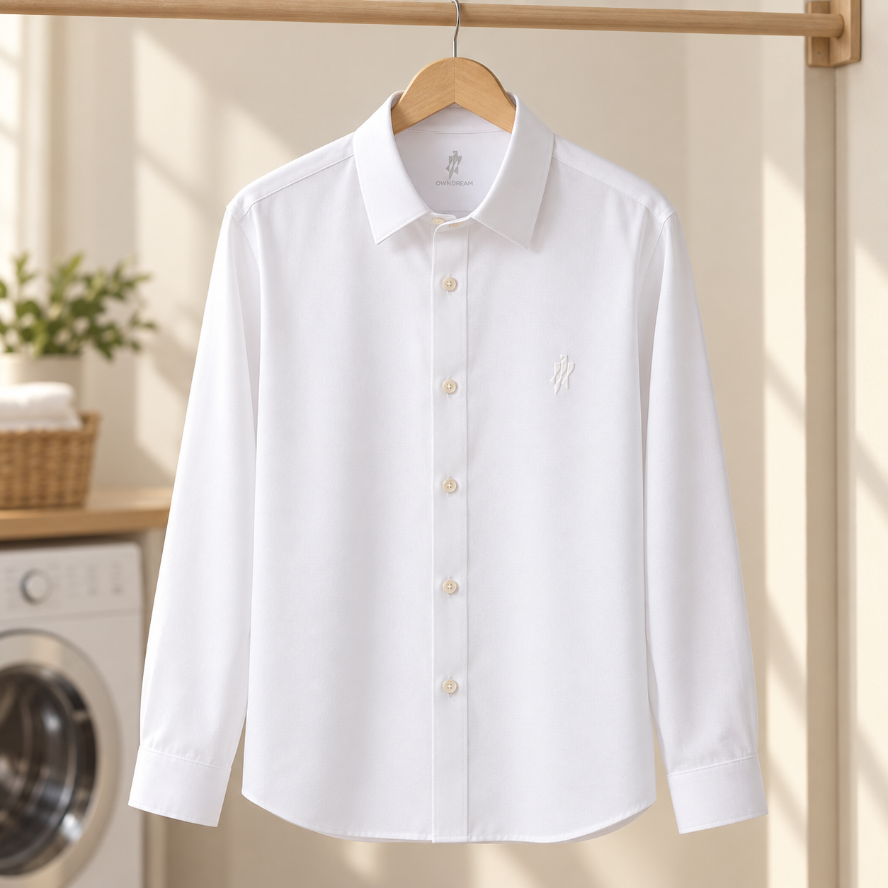 Creative easy-care scene: a smooth white shirt hanging beside a washing machine