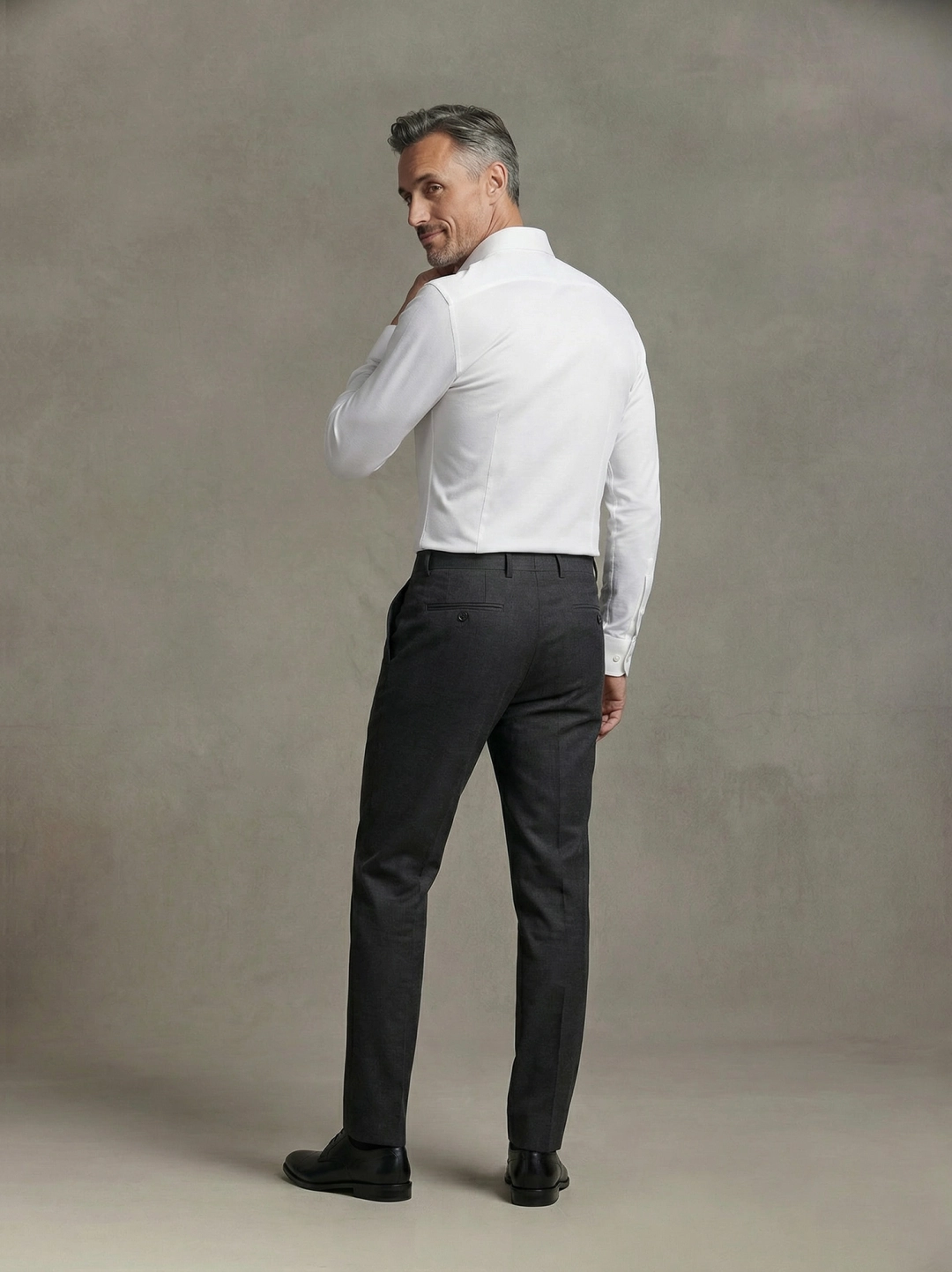 Rear three-quarter view showing shoulder movement
