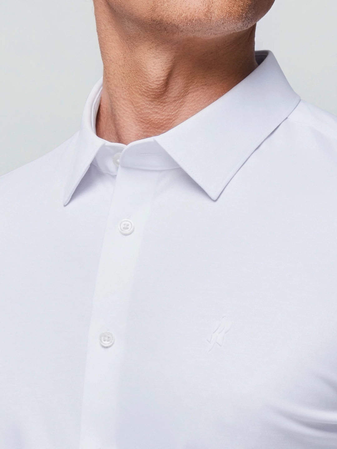 Close-up of the collar, stitching and buttons