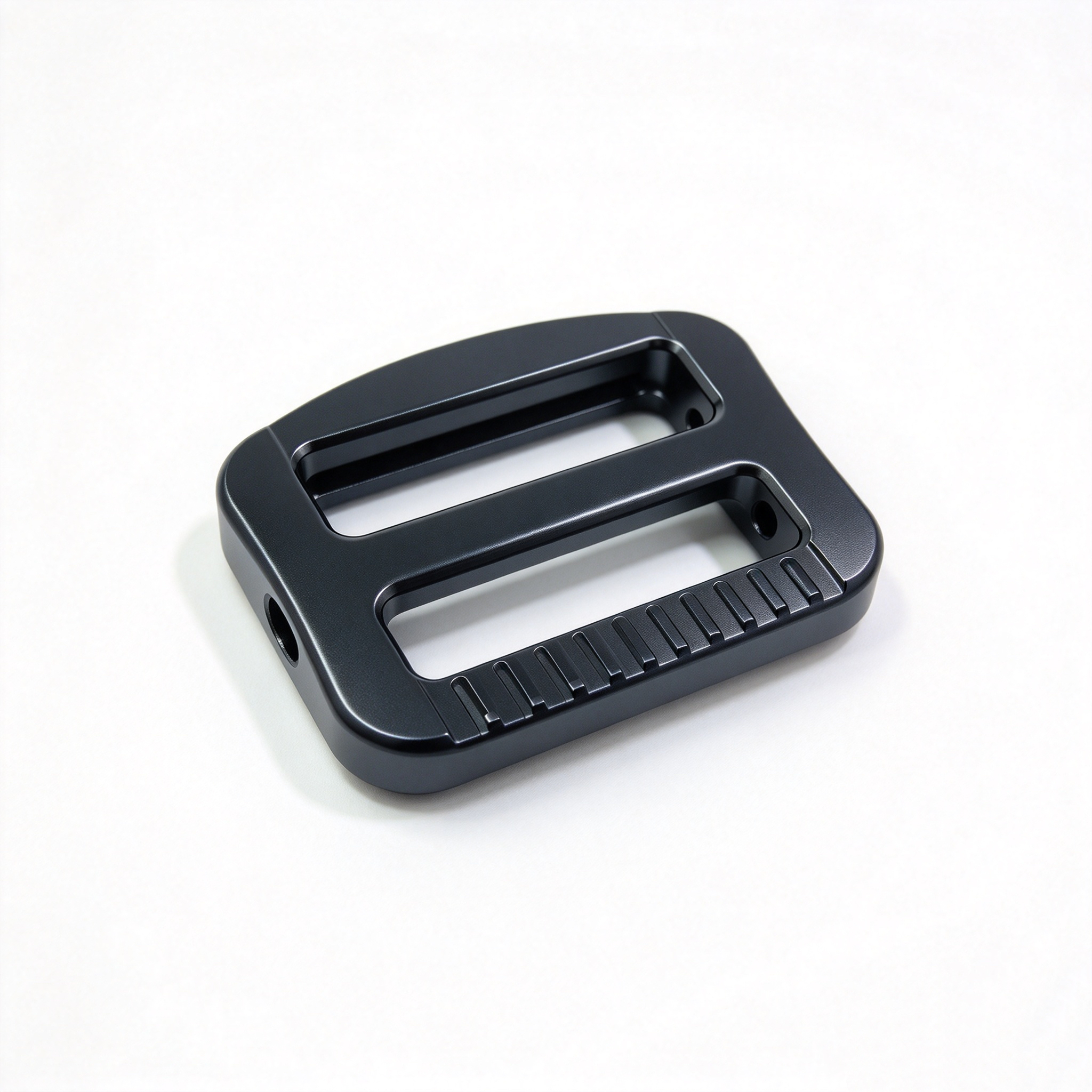 cnc machining,Grinding,precision cnc machined aluminum buckle,black anodized strap adjuster buckle,metal webbing buckle,custom hardware fitting,cnc milled component,smooth ground surface,outdoor gear buckle,bag accessory buckle