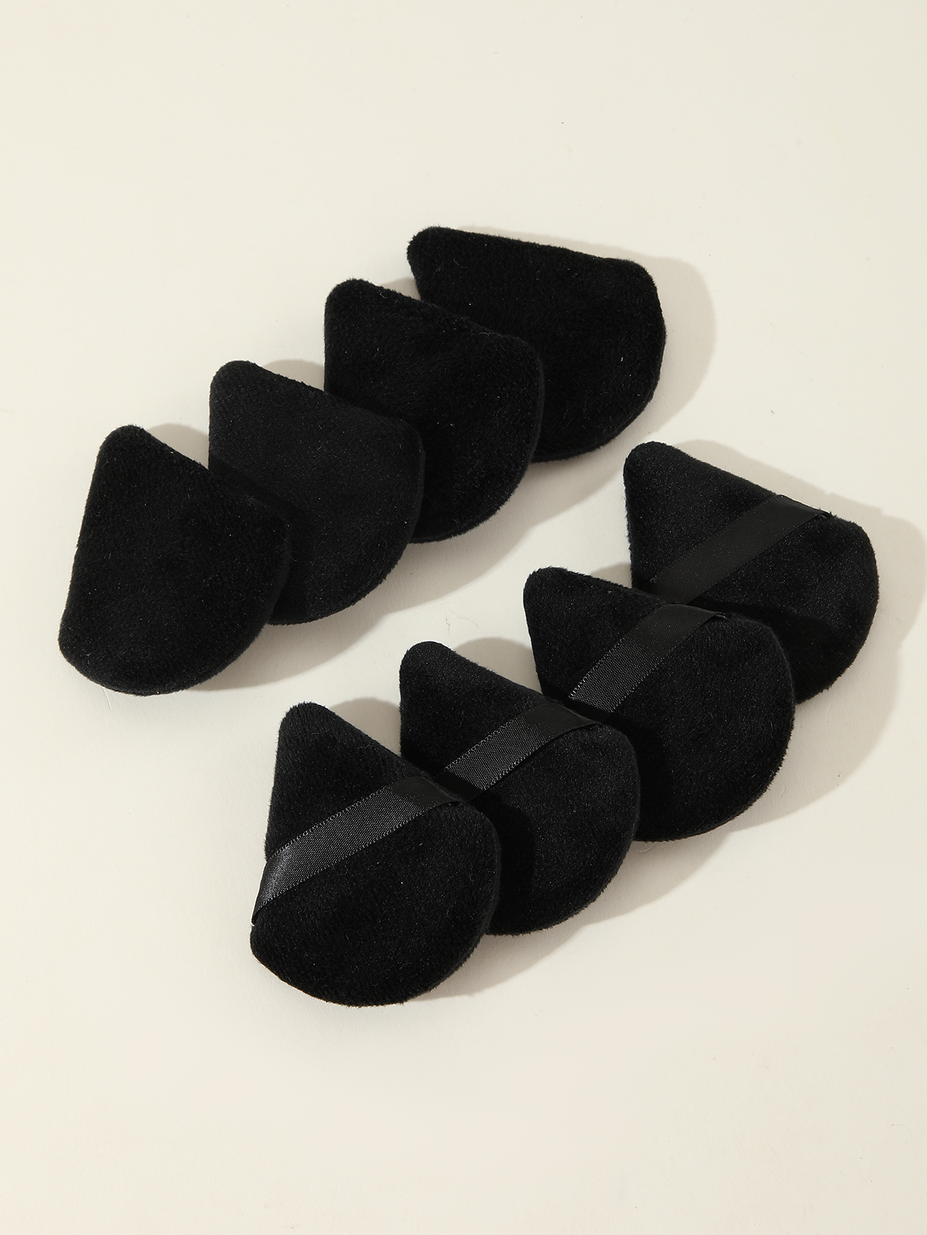 Eight Black Triangle Scalloped Powder Puffs