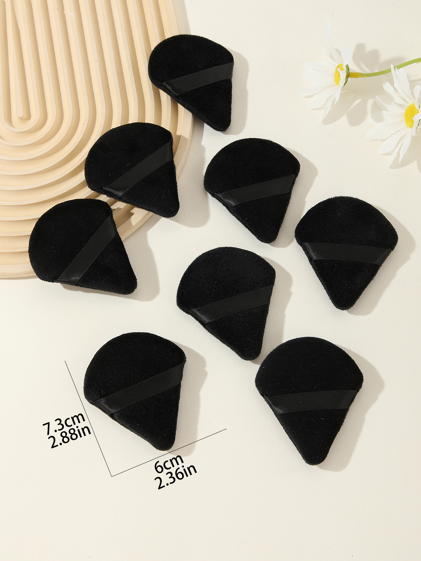 Eight Black Triangle Scalloped Powder Puffs