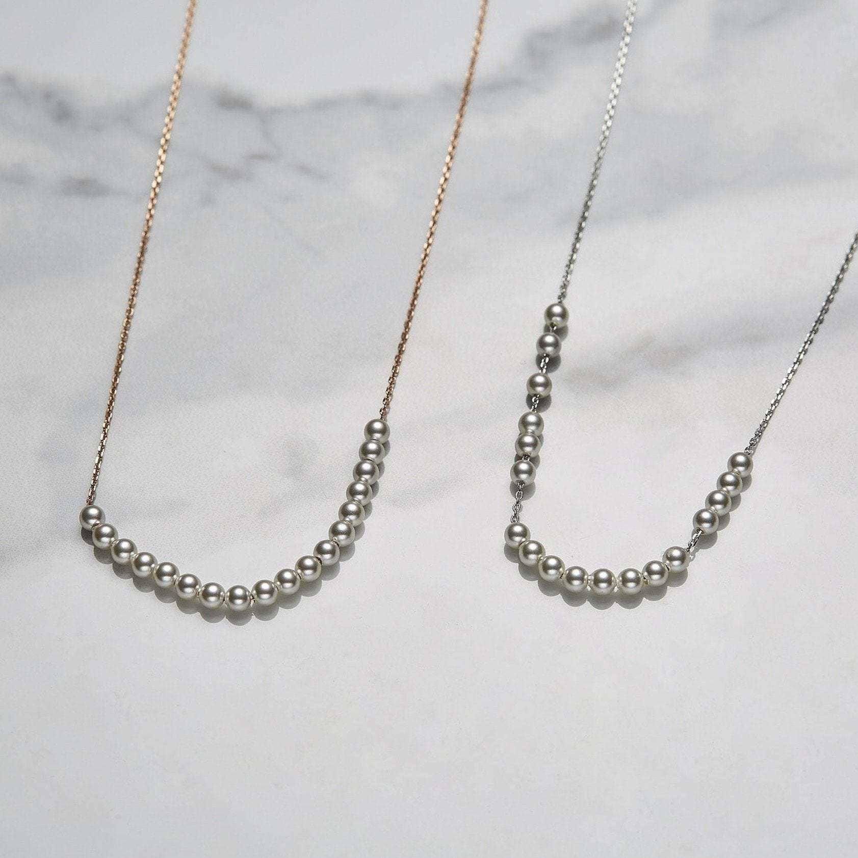 Relay pearls necklace