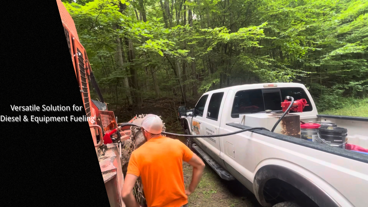 A worker fueling a diesel machine with a 12V electric fuel transfer pump, demonstrating its versatility for various equipment and vehicle fueling needs in an outdoor setting.