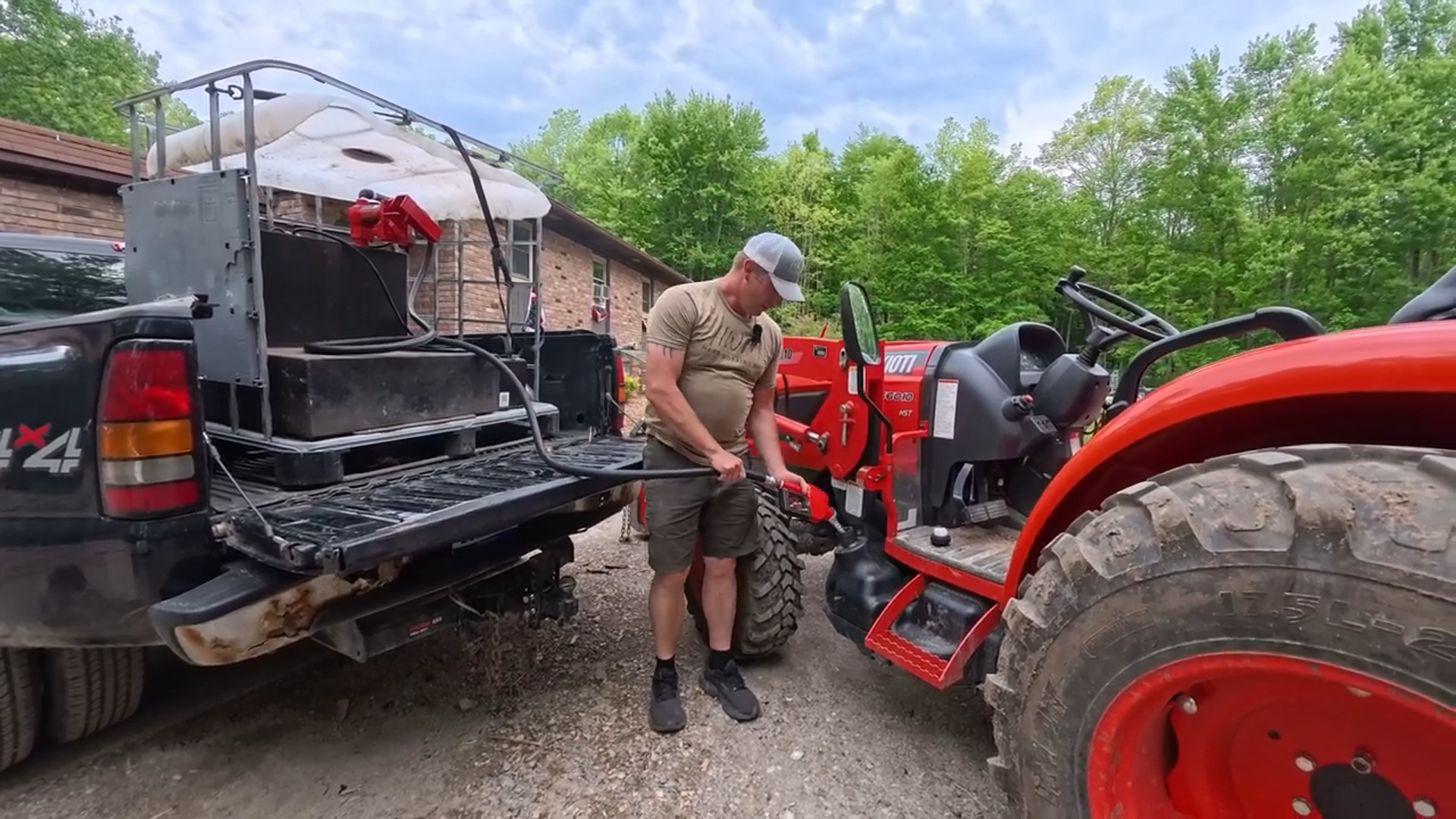 A worker using a 12V electric fuel transfer pump to refuel a diesel vehicle in an outdoor setting, demonstrating the pump's ease of use and efficiency in real-world applications.