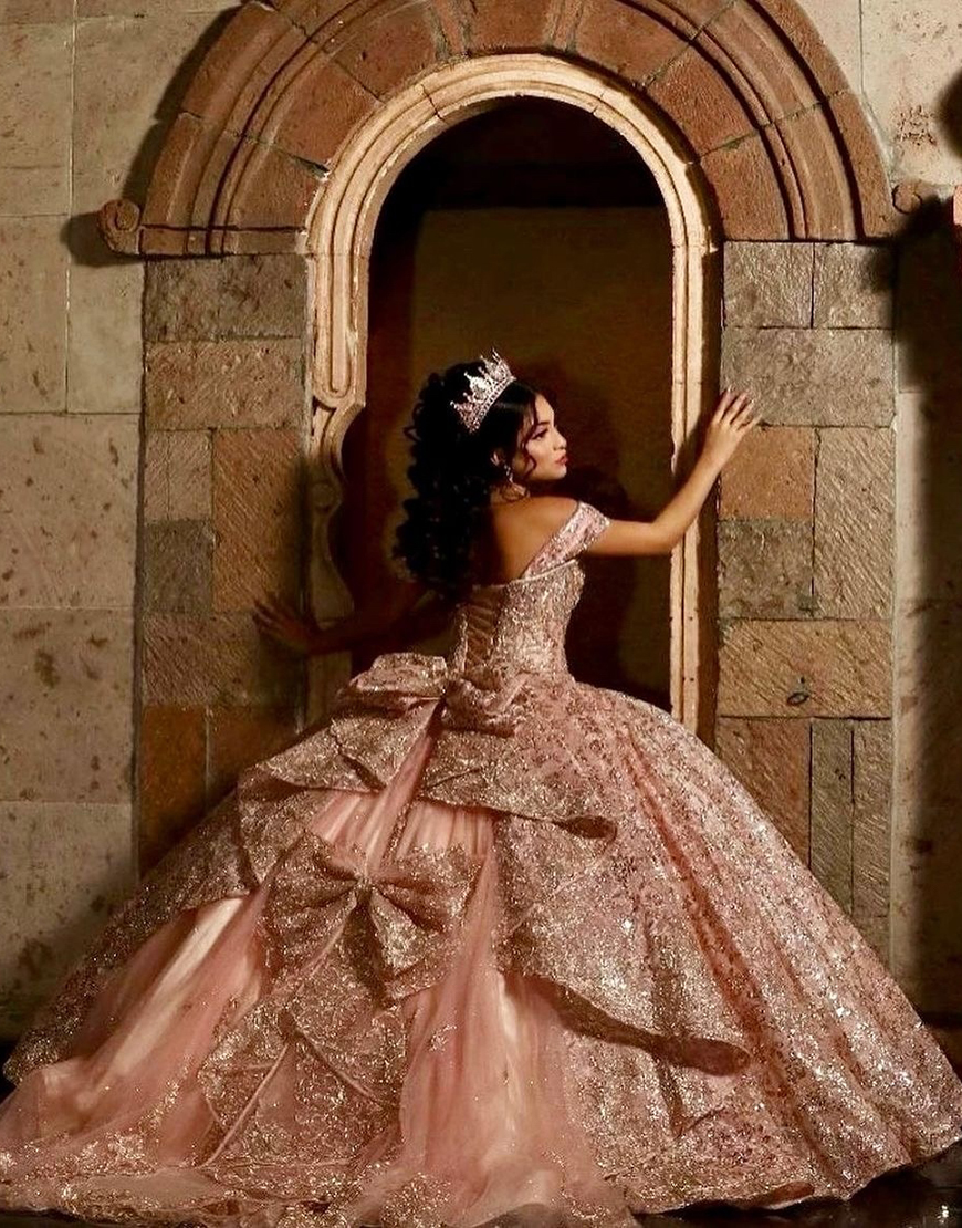 Berlinnova Women Sparkly Dusty Rose Quinceanera Dress Ball Gown Off the Shoulder Rhinestones Appliques Ruffles Bows Sweet 16 Dress