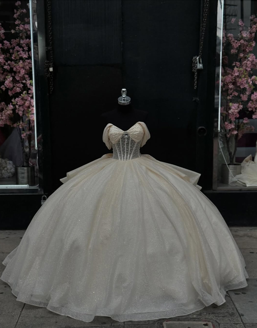 Sparkly Apricot Ball Gown Off the Shoulder Tulle Ruffle Quinceanera Dress with Bow