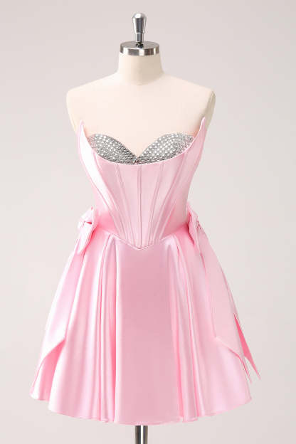 Pink A Line Strapless Corset Beaded Homecoming Dress with Bows