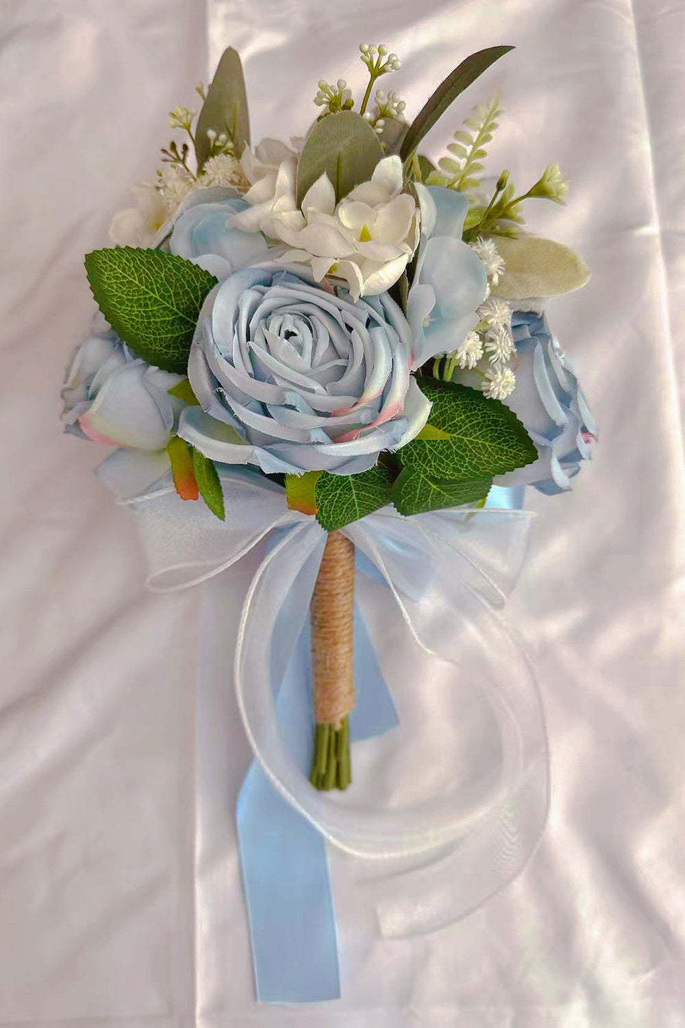 White Hand Holding Bridal Bouquet