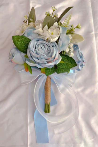 White Hand Holding Bridal Bouquet