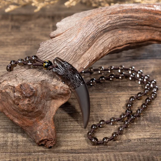 https://ae01.alicdn.com/kf/H78cd4e39429d4b75aaeabaf1727f91adp/Nature-Obsidian-Wolf-Tooth-Pendant-Necklaces-Lucky-Beaded-Rope-Couple-Necklaces-Black-and-Ice-Obsidian-Amulets.jpg_640x640.jpg