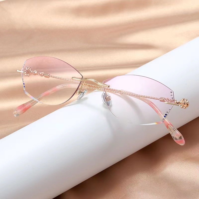 IRREGULAR FRAMELESS SAPPHIRE READING GLASSES