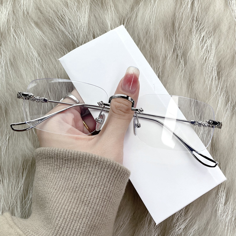 OPTIGEMS 2024 New business rimless metal color-changing glasses