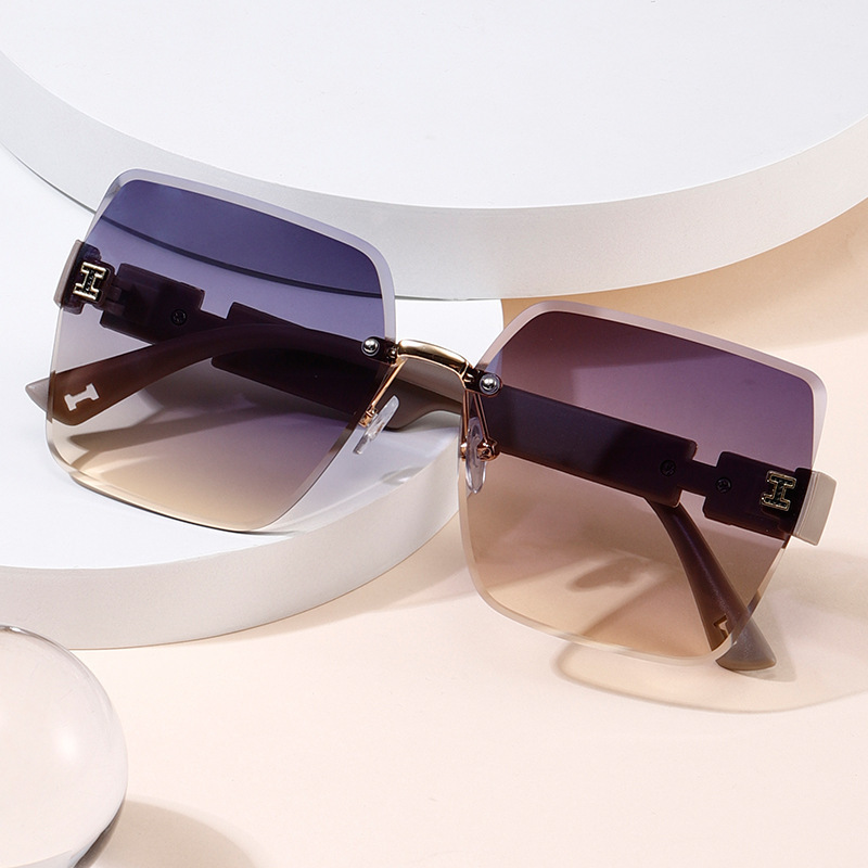 Fashionsotrea  2024 New Fashionable H-Shaped Rimless Cut-edge Sunglasses
