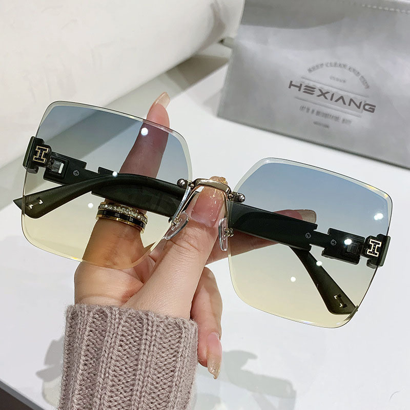 Fashionsotrea  2024 New Fashionable H-Shaped Rimless Cut-edge Sunglasses