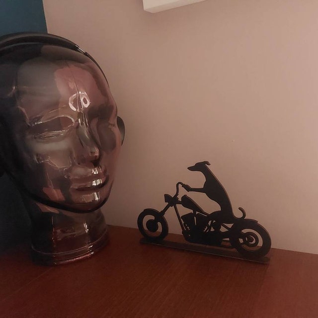 Whippet Greyhound riding a motorbike scooter or bicycle silhouette ornament