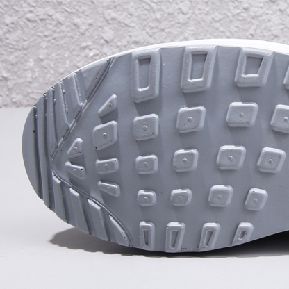 Atmungsaktive Luftpolster-Sneaker für Damen aus Fliegenstrick