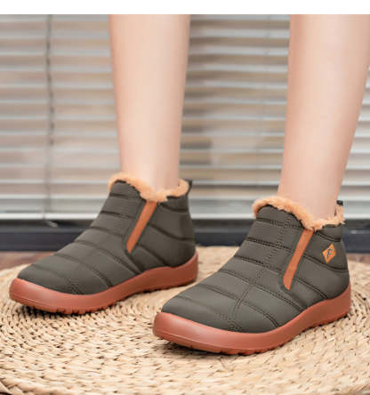 Neue warme Schneeschuhe aus Wintersamt und Baumwolle