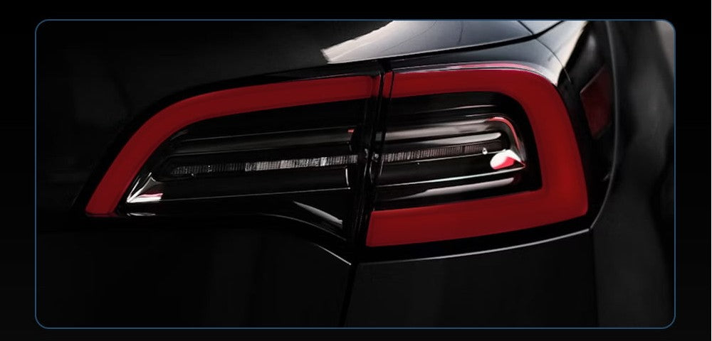 Before Installation showing original Tesla tail lights with standard halogen lighting