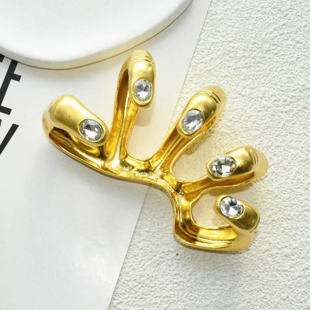 Sculptural hand-armor ring