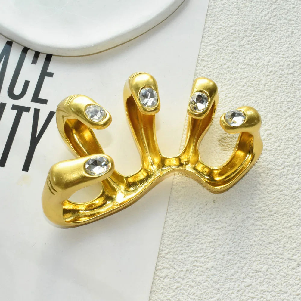 Sculptural hand-armor ring