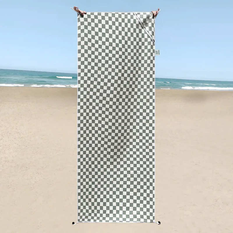 Portable beach towel with pocket