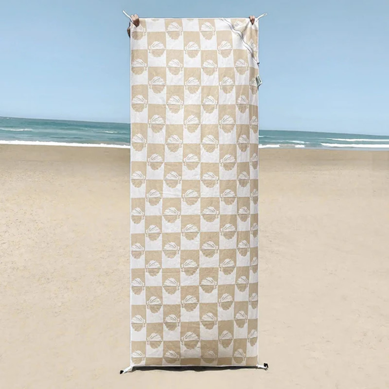 Portable beach towel with pocket