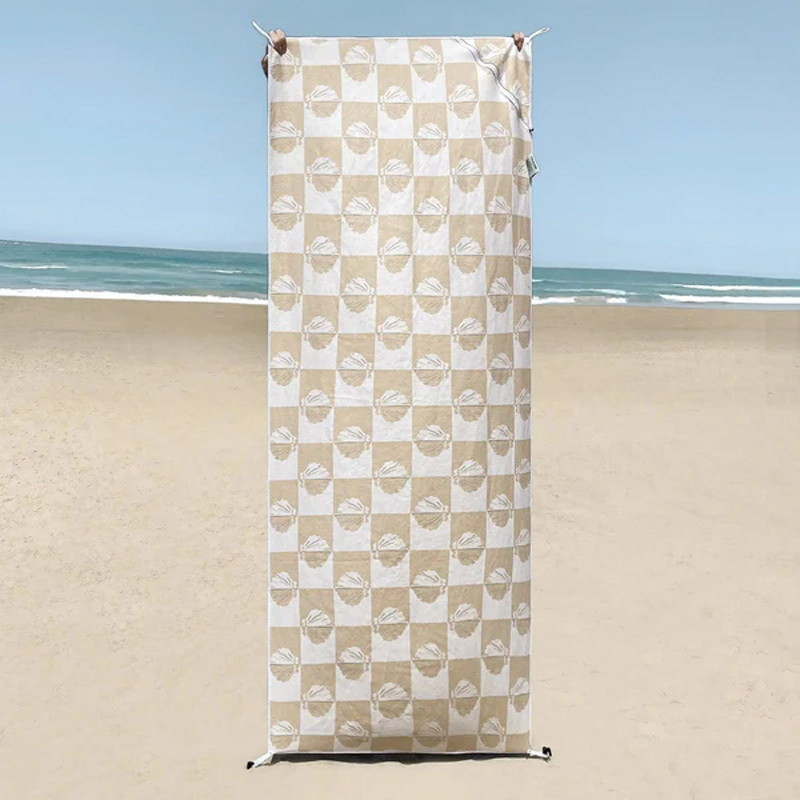 Portable beach towel with pocket