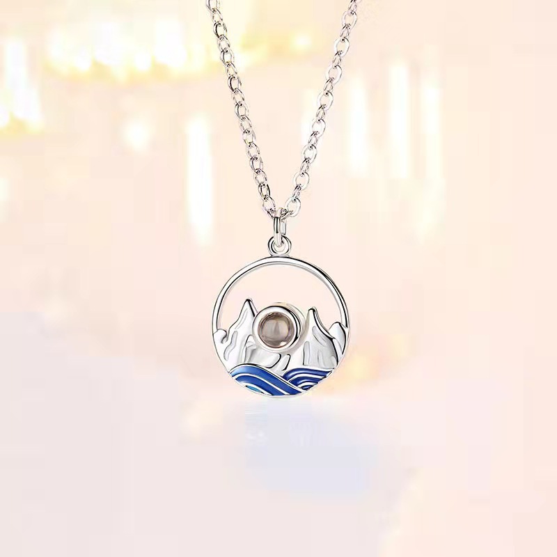 Personalized micro-engraved projection necklace
