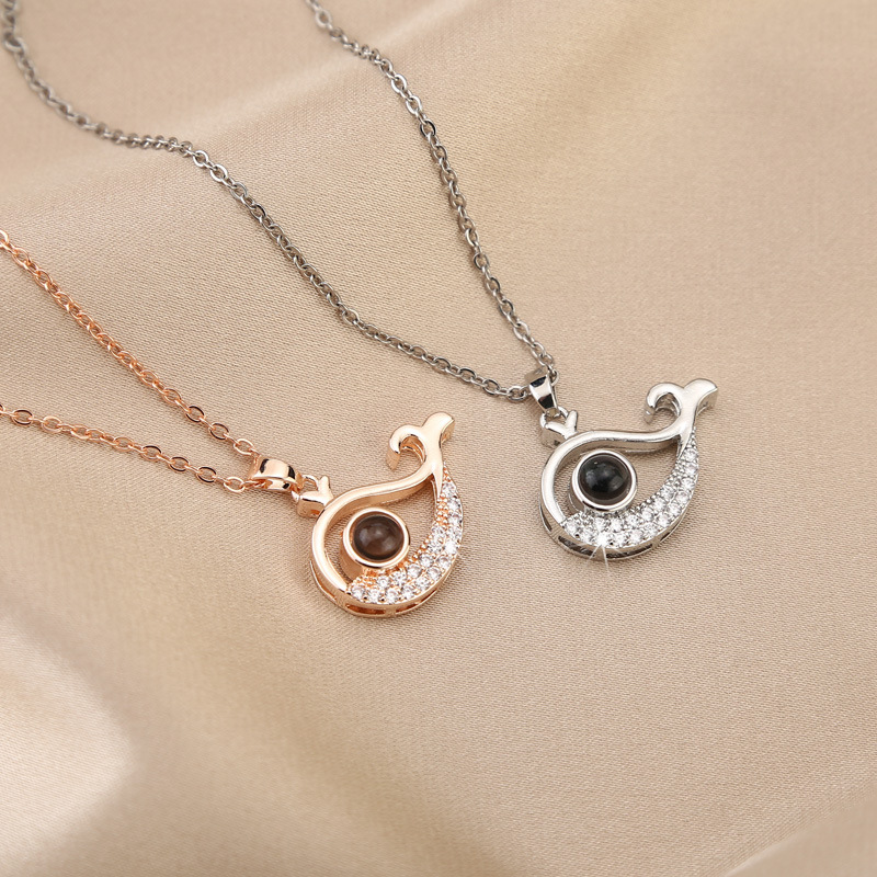 Personalized baby whale projection bracelet