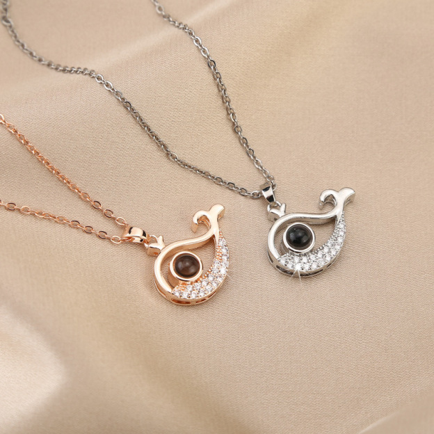 Personalized baby whale projection bracelet