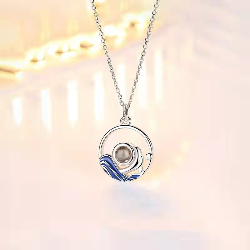 Personalized micro-engraved projection necklace