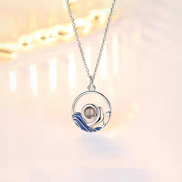 Personalized micro-engraved projection necklace