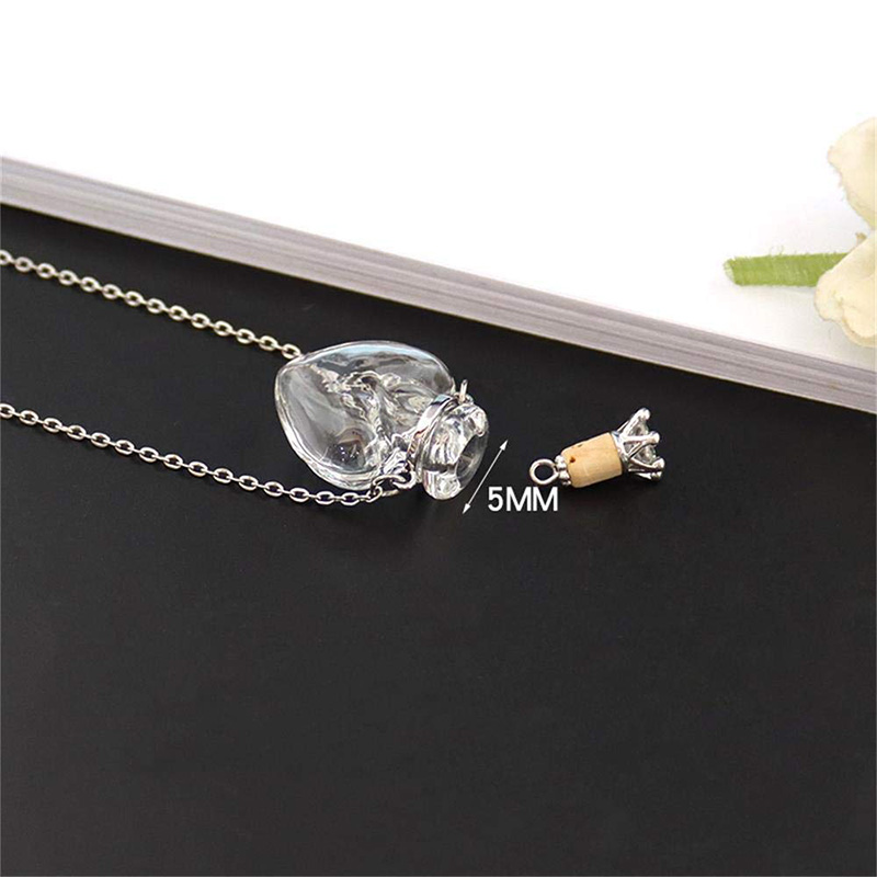 Heart-shaped necklace with crown-shaped wishing bottle