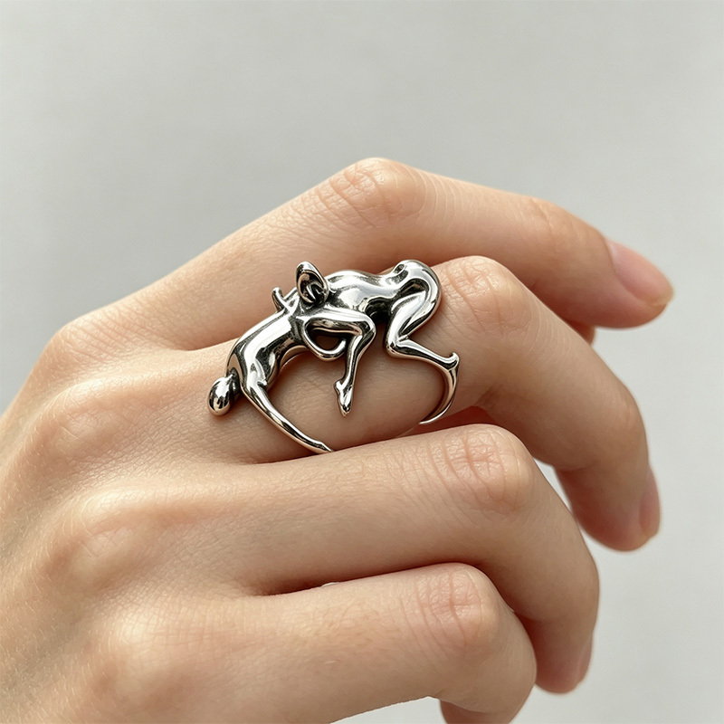 Retro abstract human figure sculpture ring