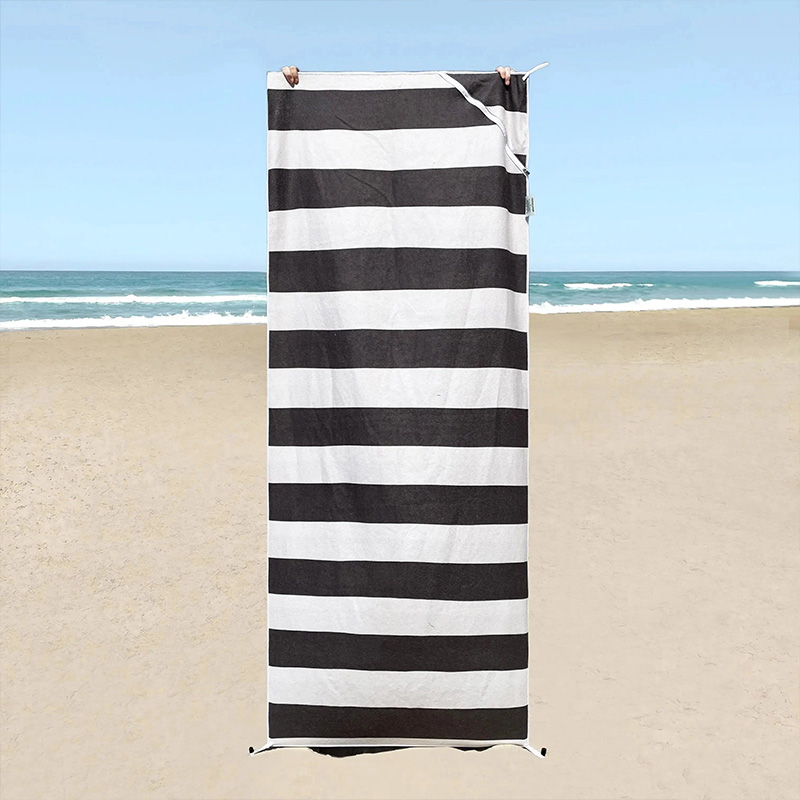 Portable beach towel with pocket