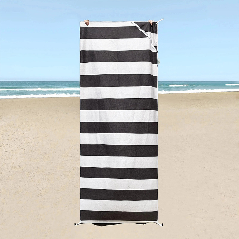 Portable beach towel with pocket