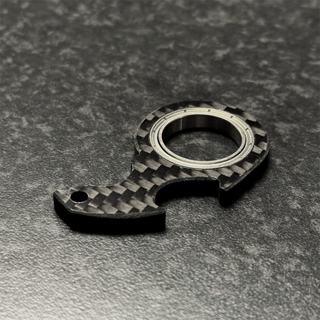 Rotating decompression keychain