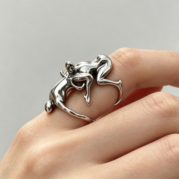 Retro abstract human figure sculpture ring