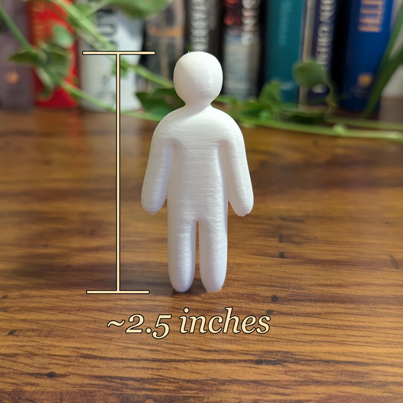 Miniature doll statue