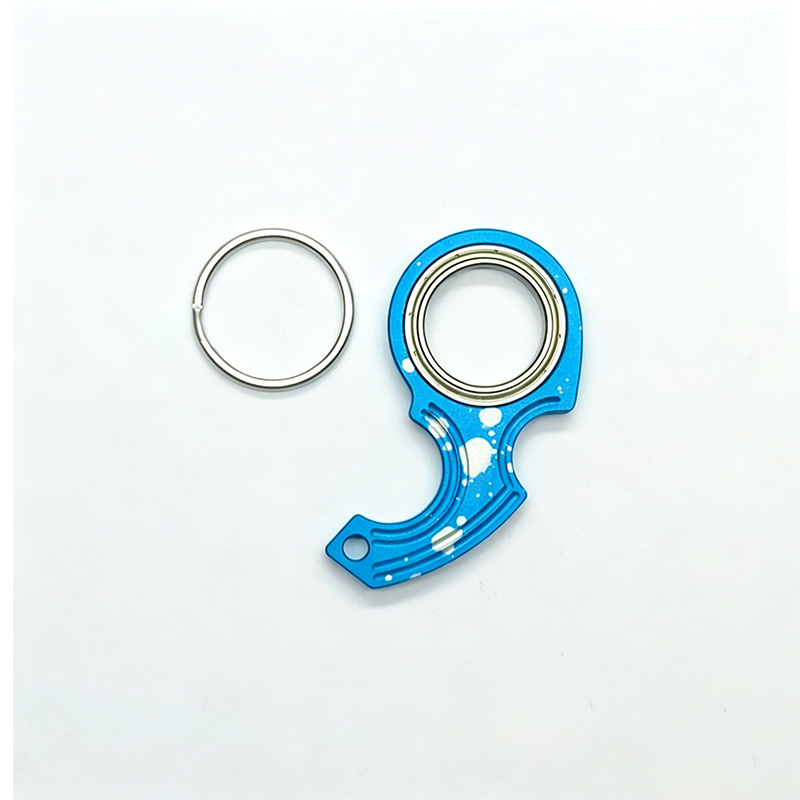 Rotating decompression keychain