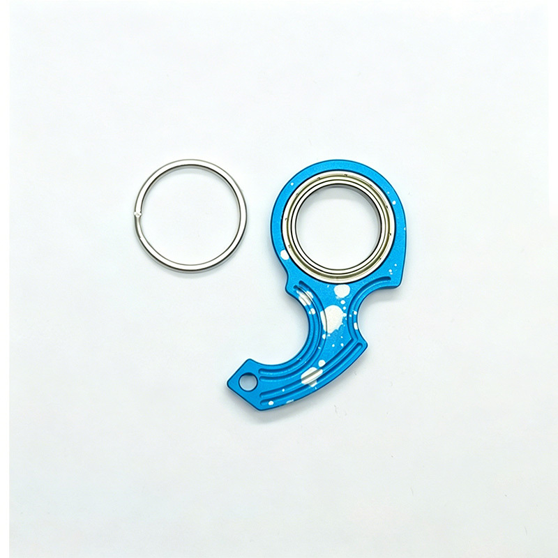Rotating decompression keychain