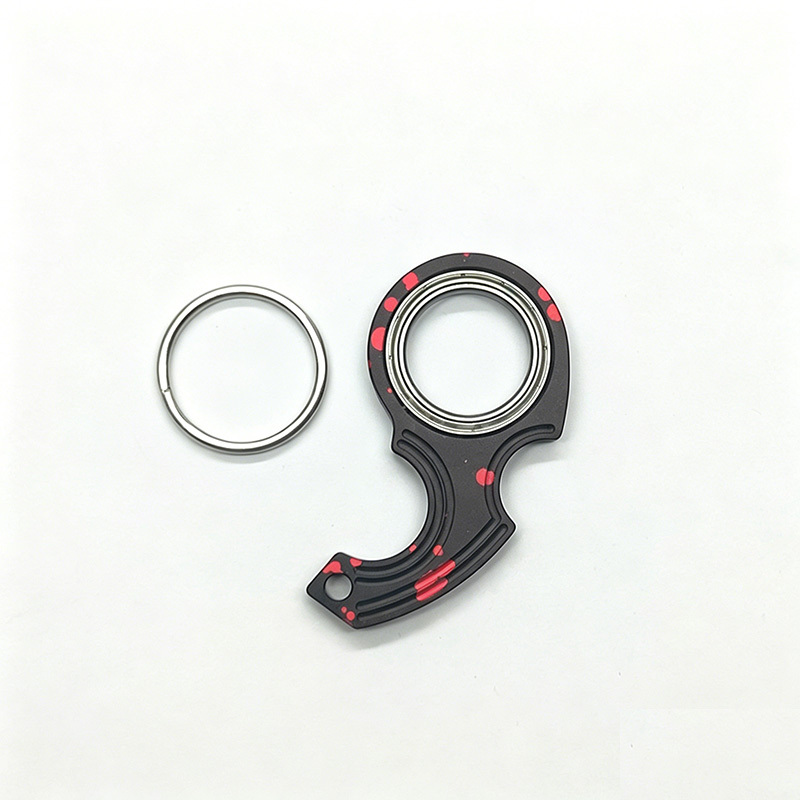 Rotating decompression keychain